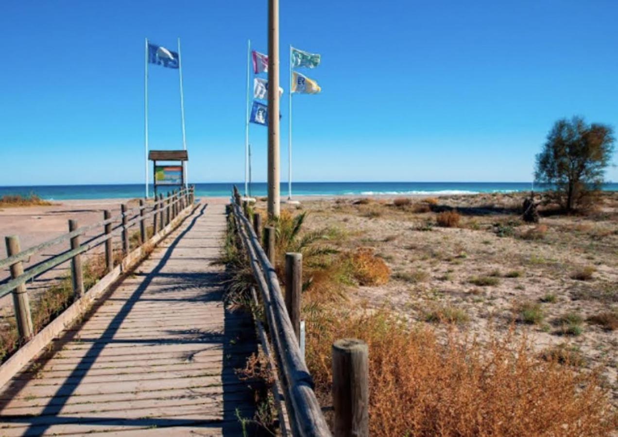 Bonito adosado con jardín en la playa de Almardá Villa Sagunto Esterno foto